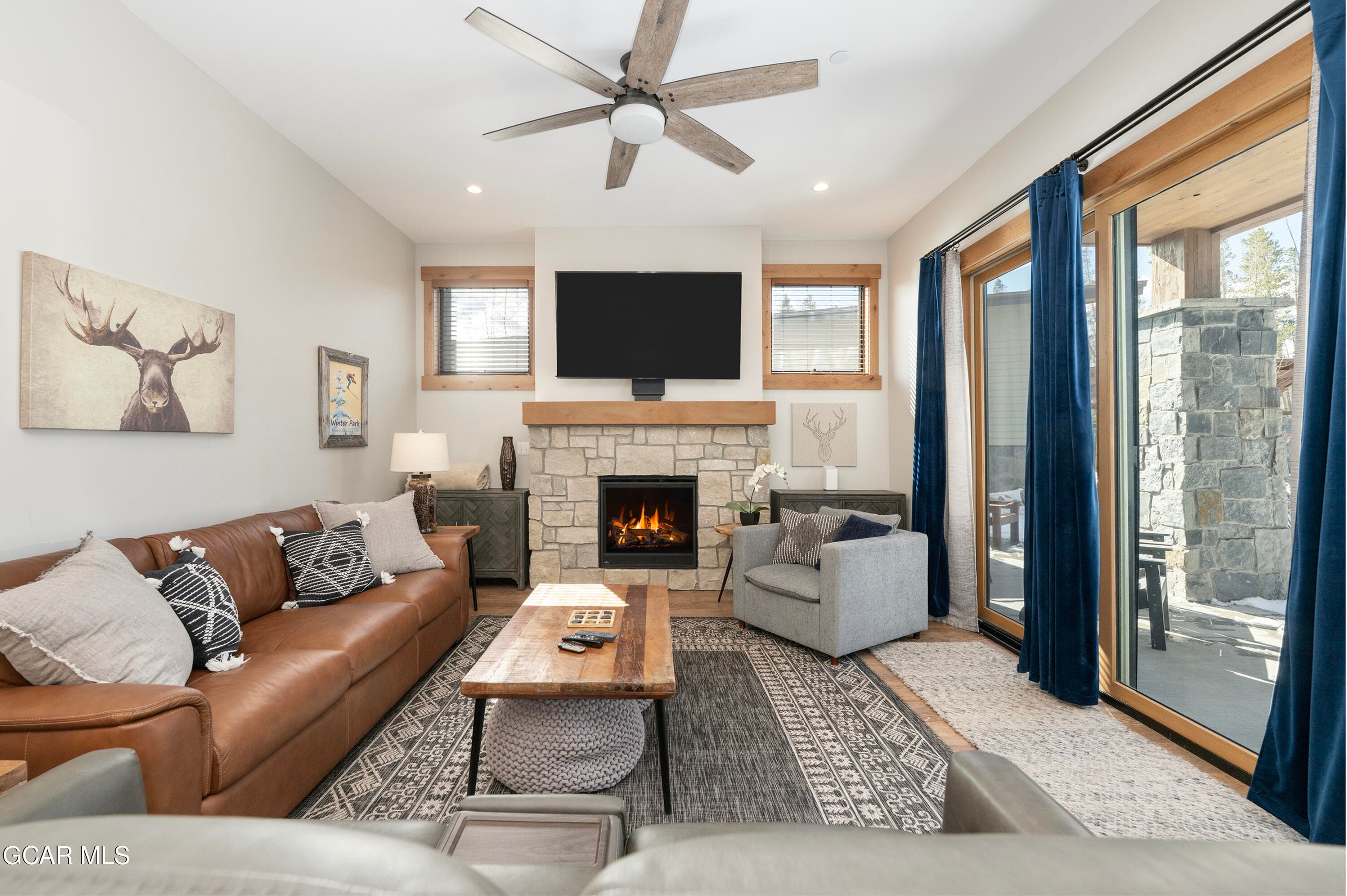 living room with cozy fireplace