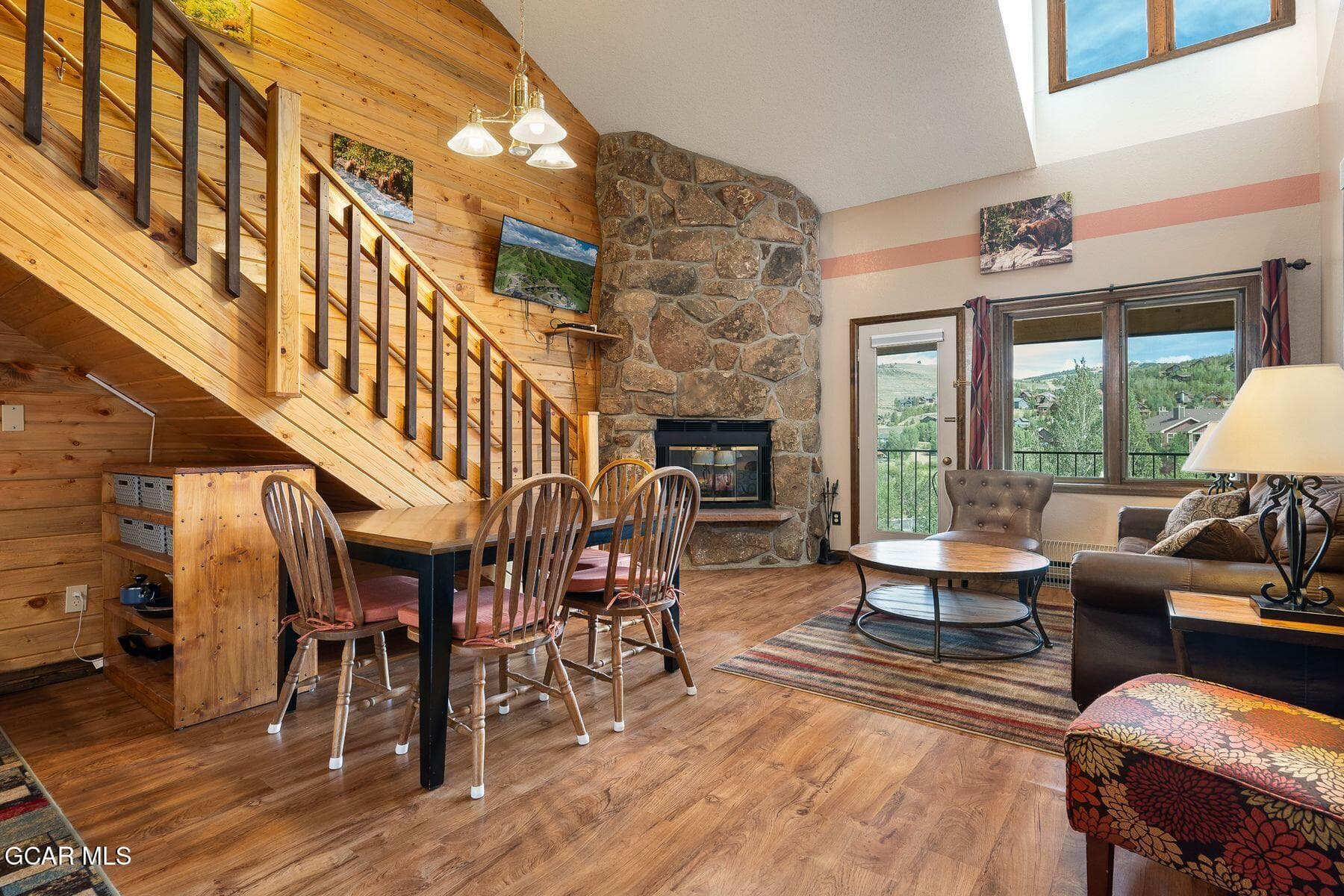 Living room with lofted ceilings