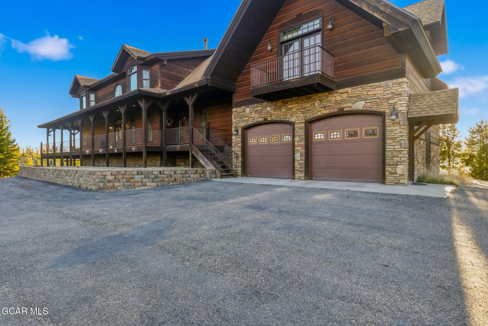 Front elevation, wraparound covered porc